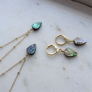 Two Abalone Leaf necklaces are displayed besides the Abalone Leaf earrings.